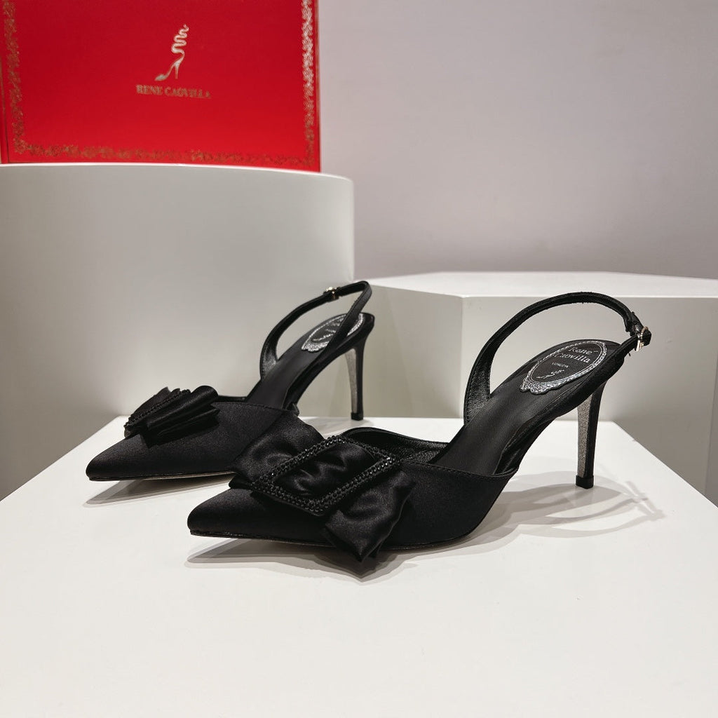 Tacones de cristal con lazo de seda