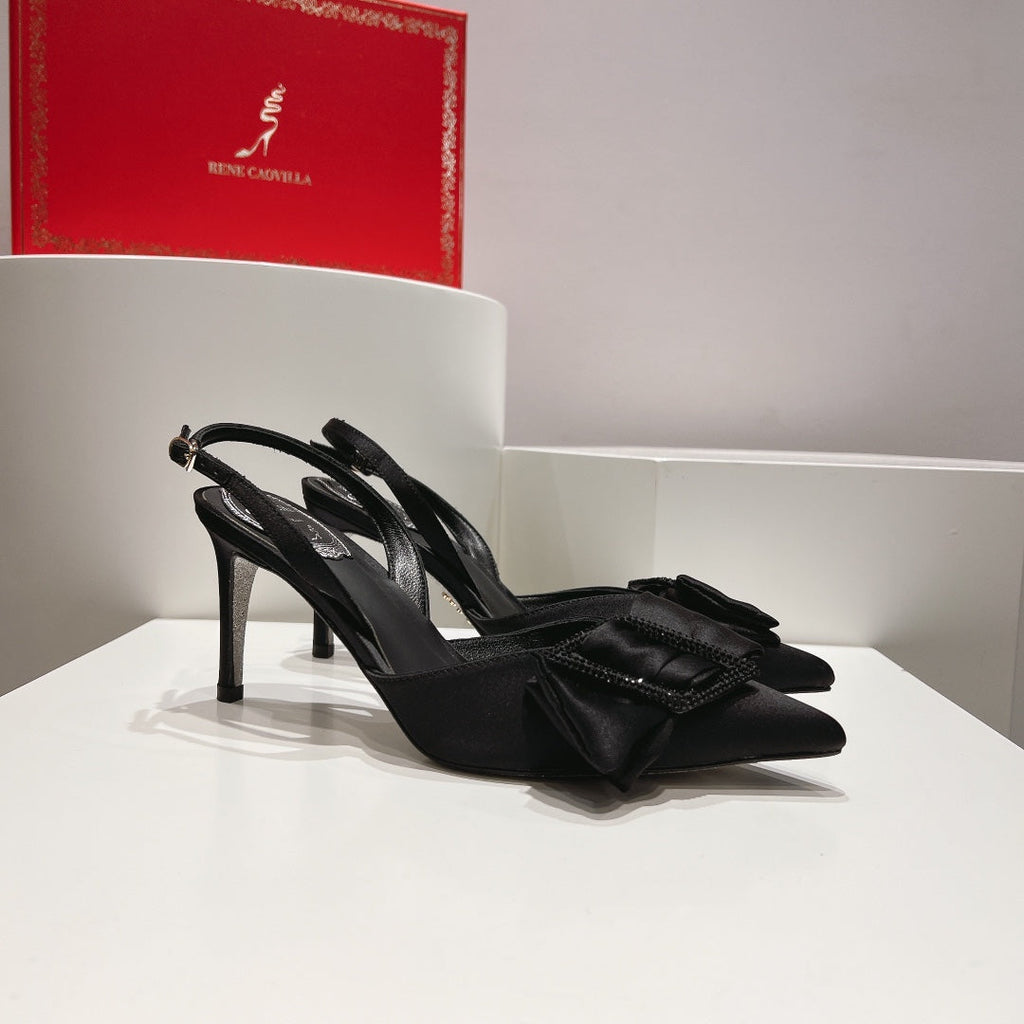 Tacones de cristal con lazo de seda