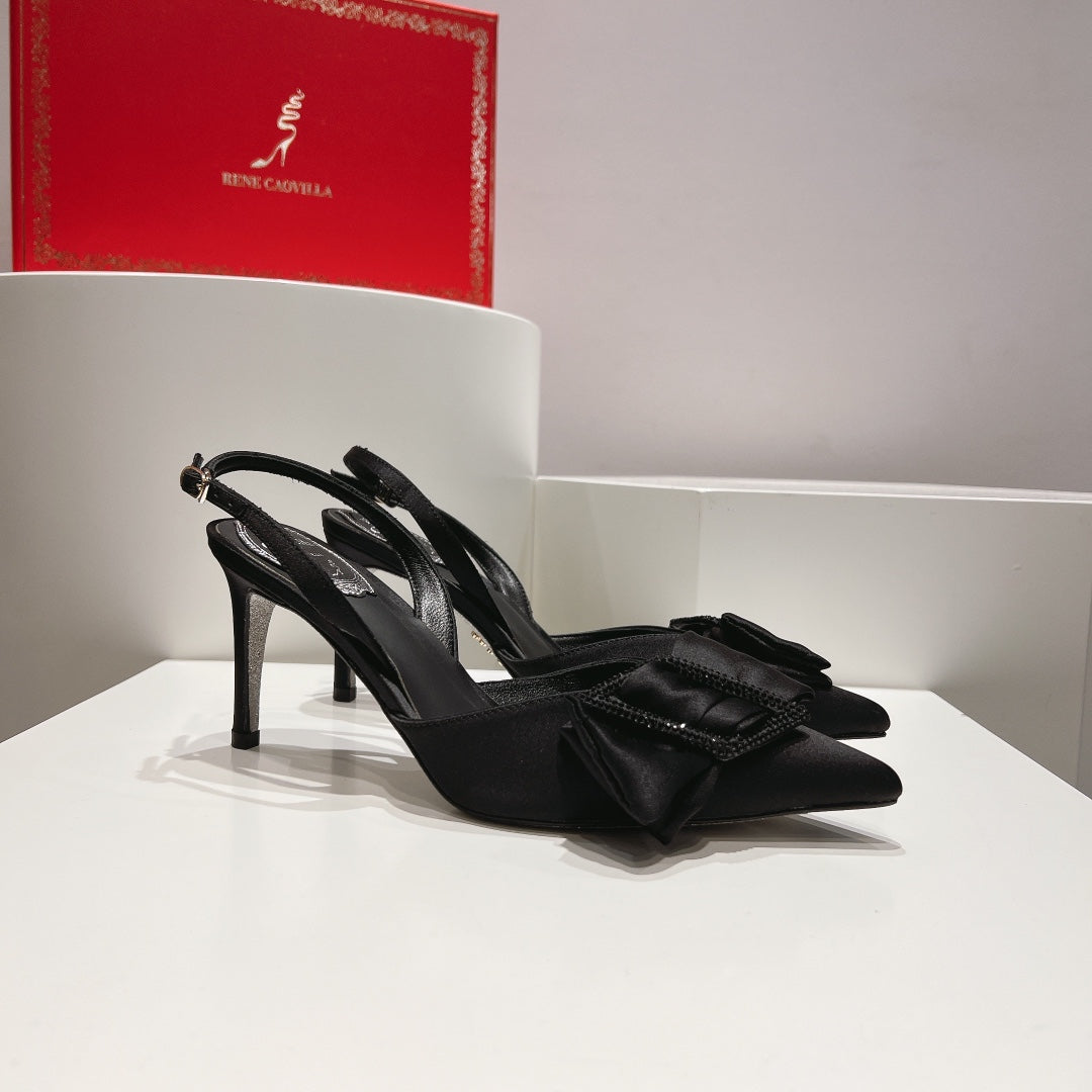Tacones de cristal con lazo de seda