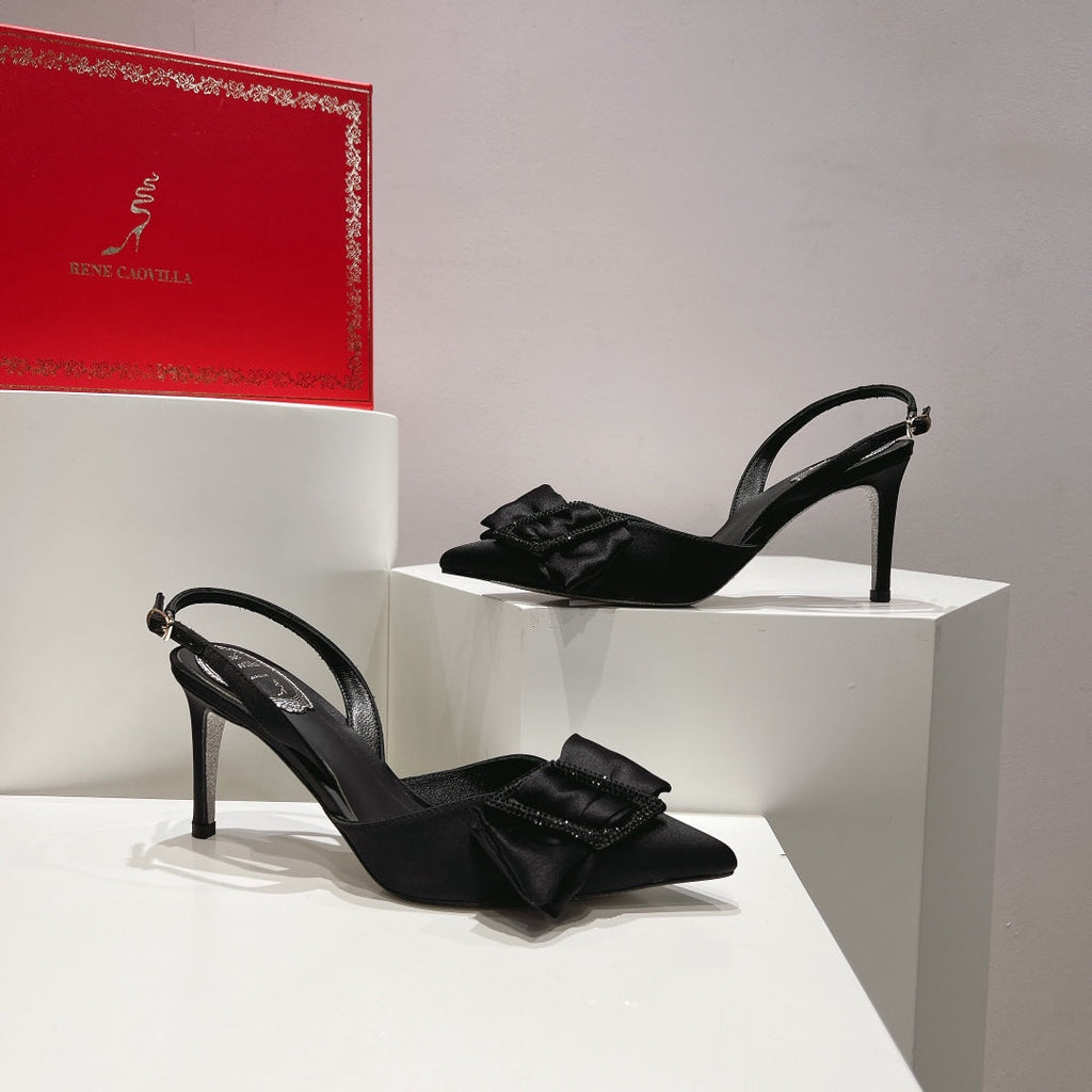 Tacones de cristal con lazo de seda