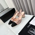 Zapatos de tacón con tira trasera bicolor