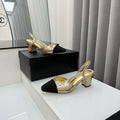 Zapatos de tacón con tira trasera bicolor