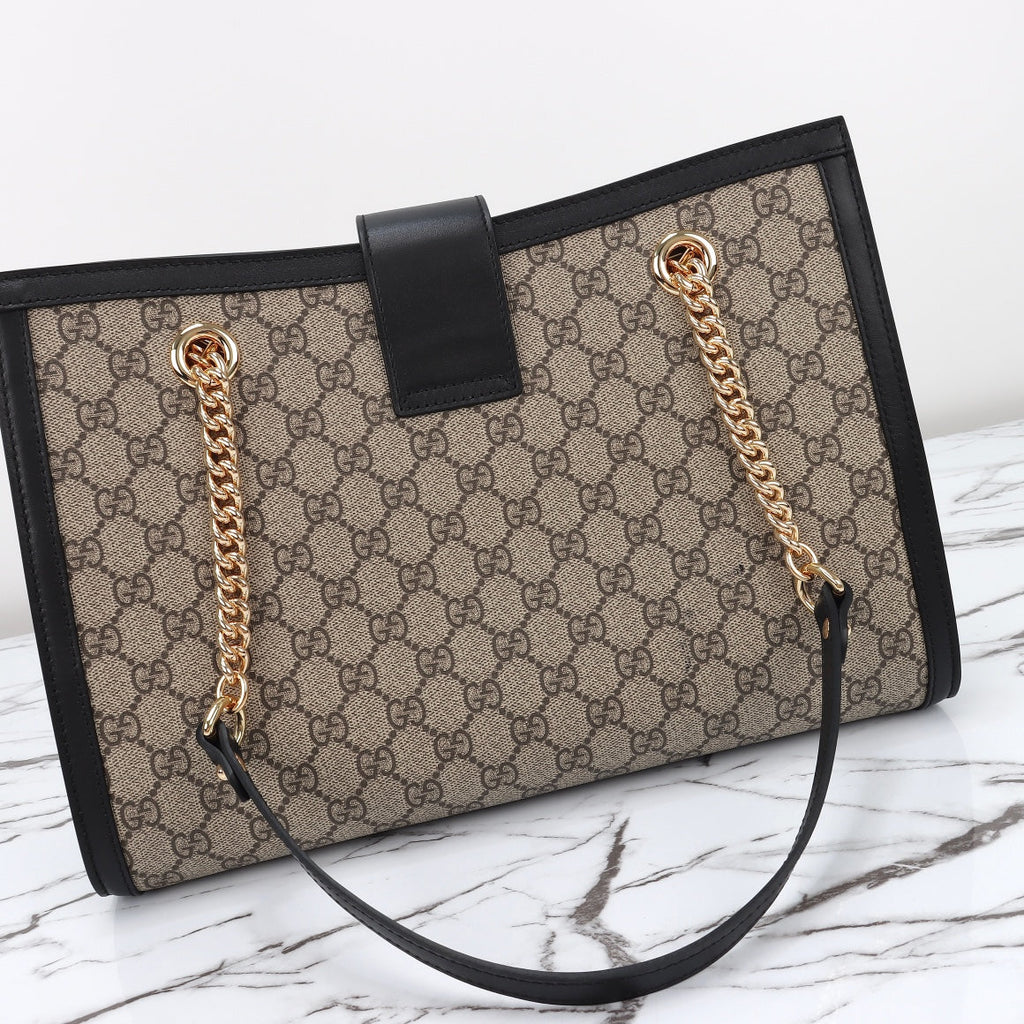 Bolso de cuero con candado