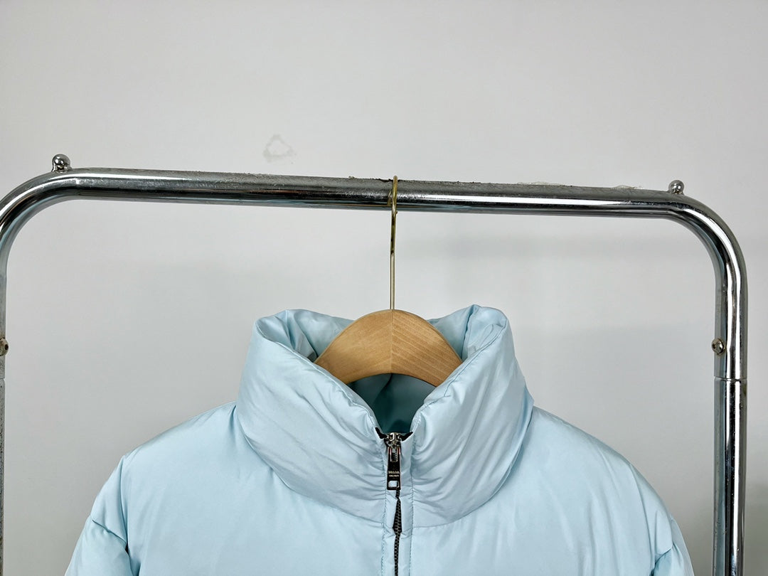 Chaqueta corta de plumas