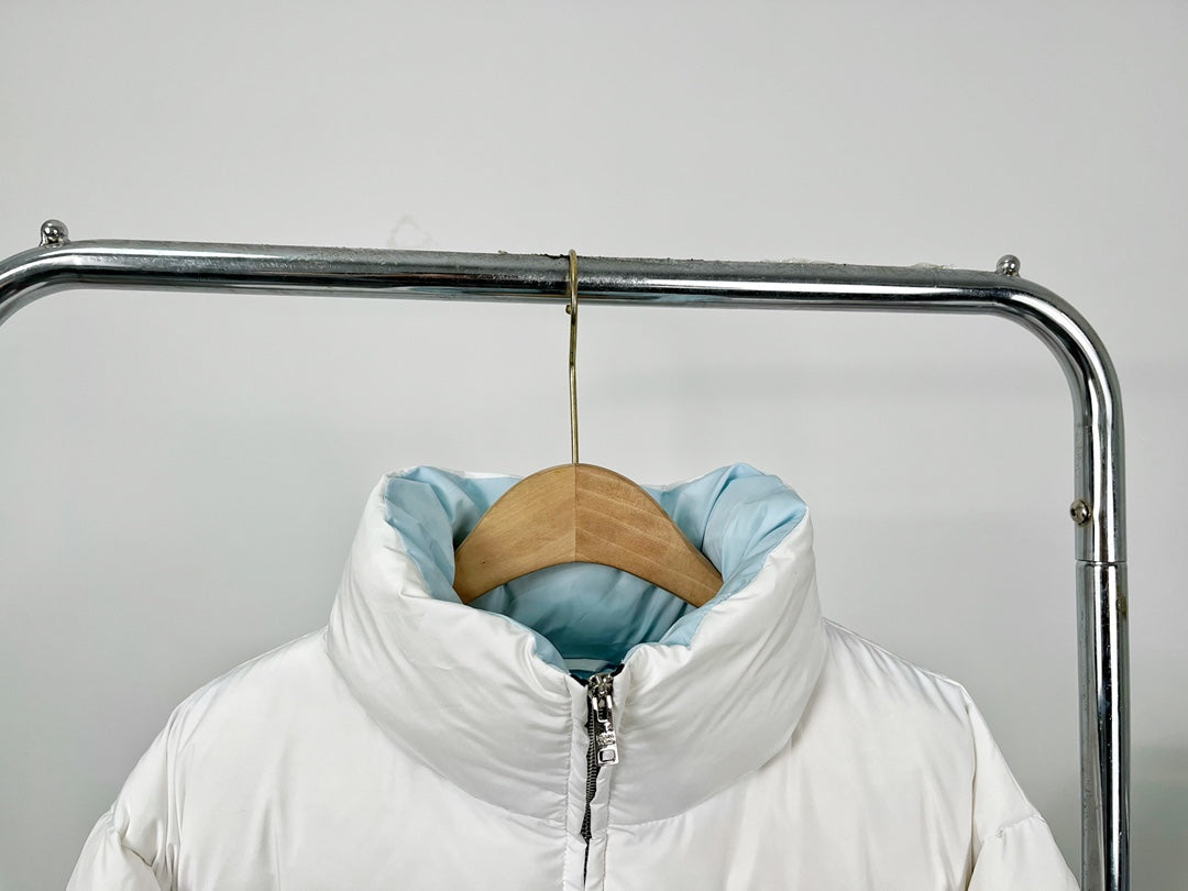 Chaqueta corta de plumas