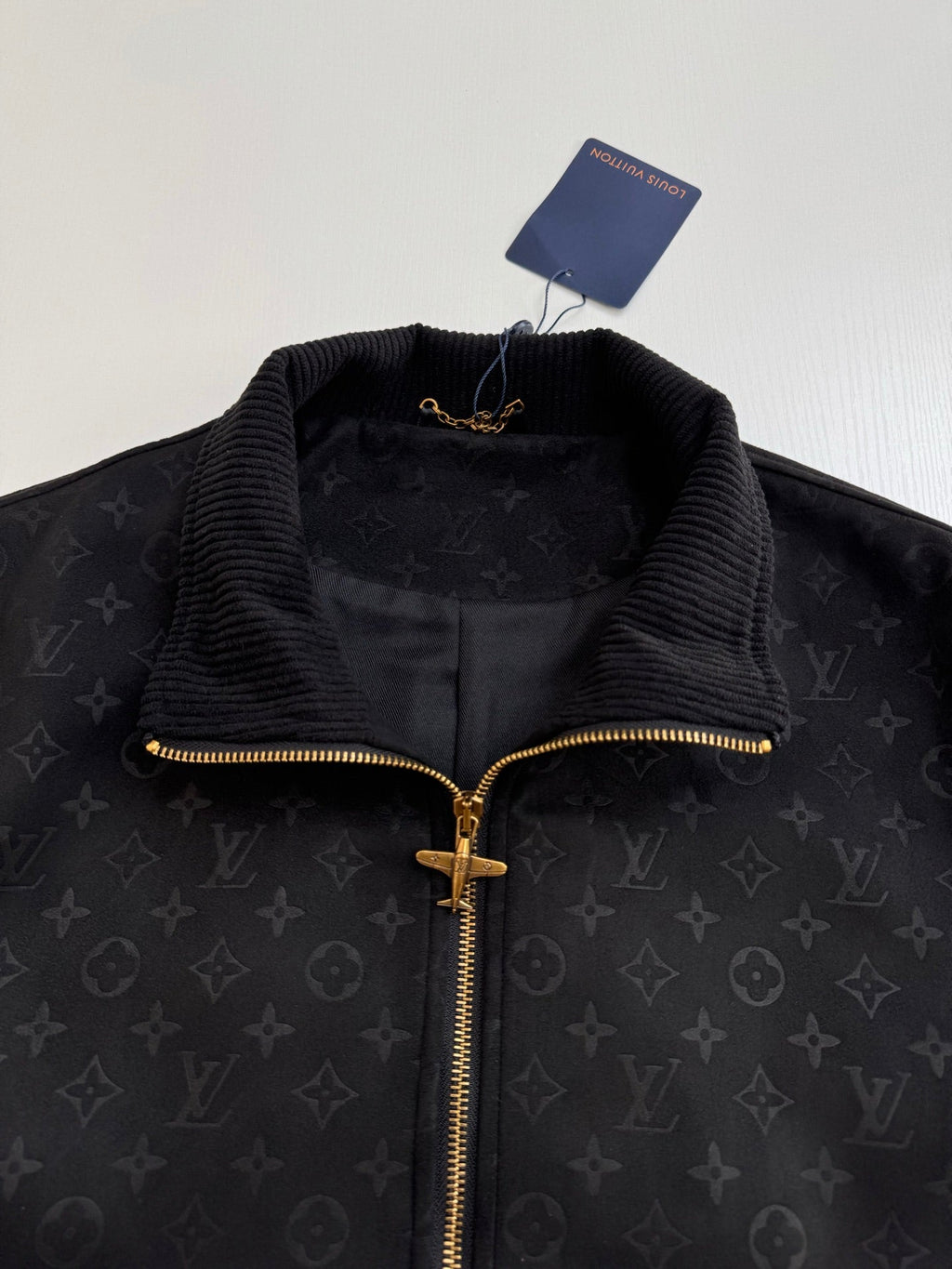 Chaqueta de estilo cuero con monograma integral