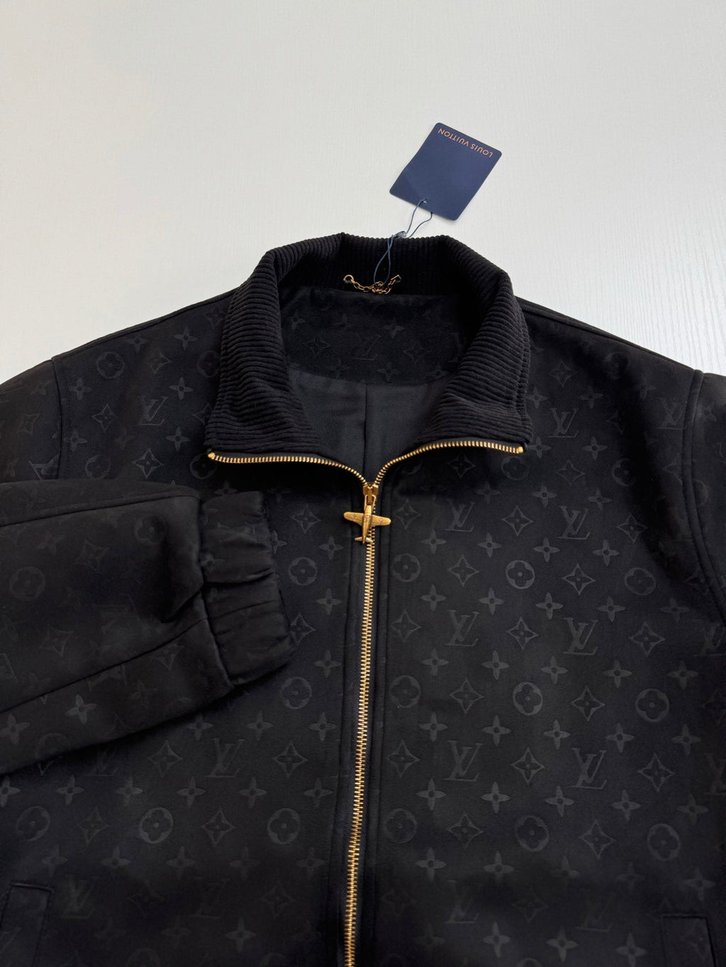 Chaqueta de estilo cuero con monograma integral