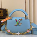 Capuchinas Este Oeste Mini Azul