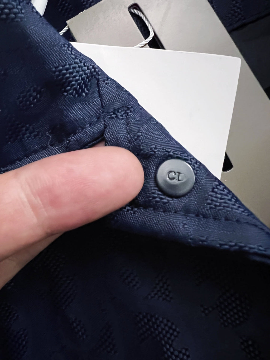 Chaqueta con solapa y monograma