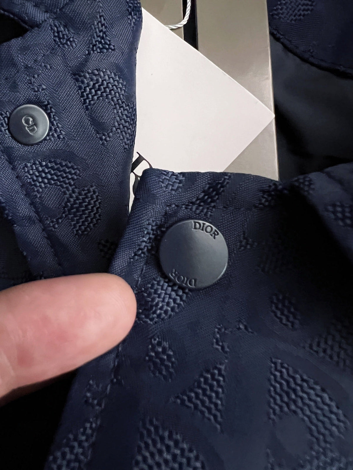 Chaqueta con solapa y monograma