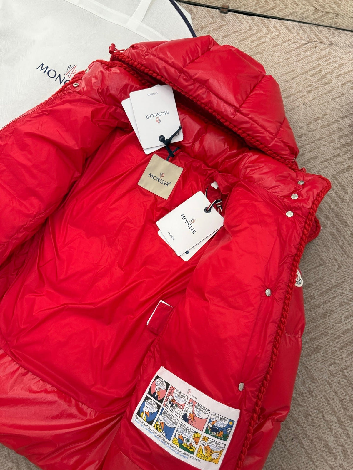 Chaqueta de plumas con capucha Glarein