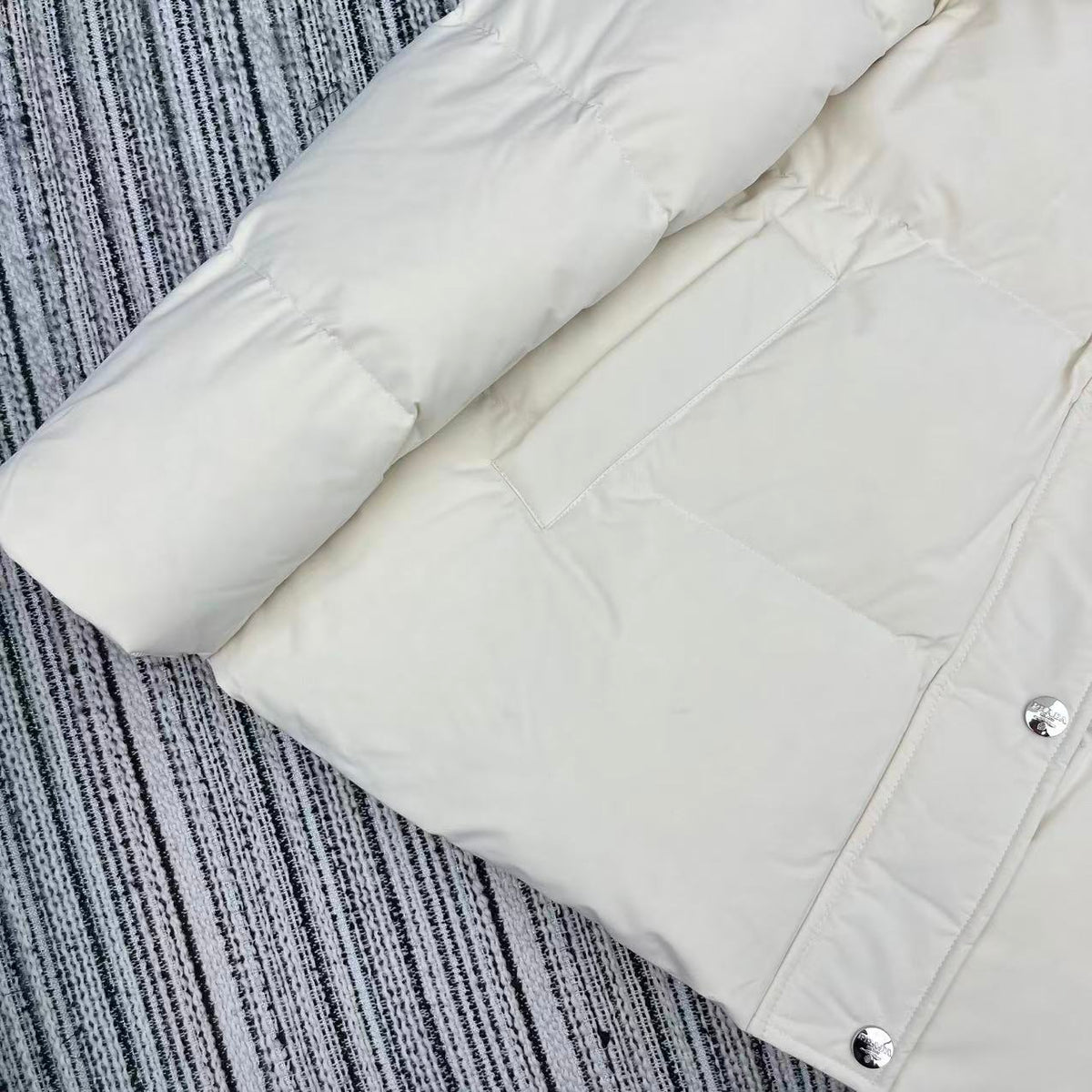 Chaqueta de plumas blanca