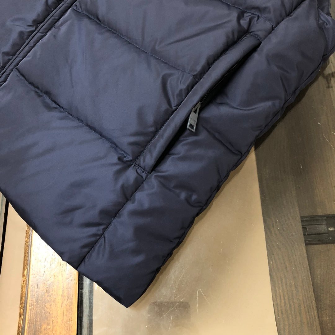 Chaleco clásico de plumas