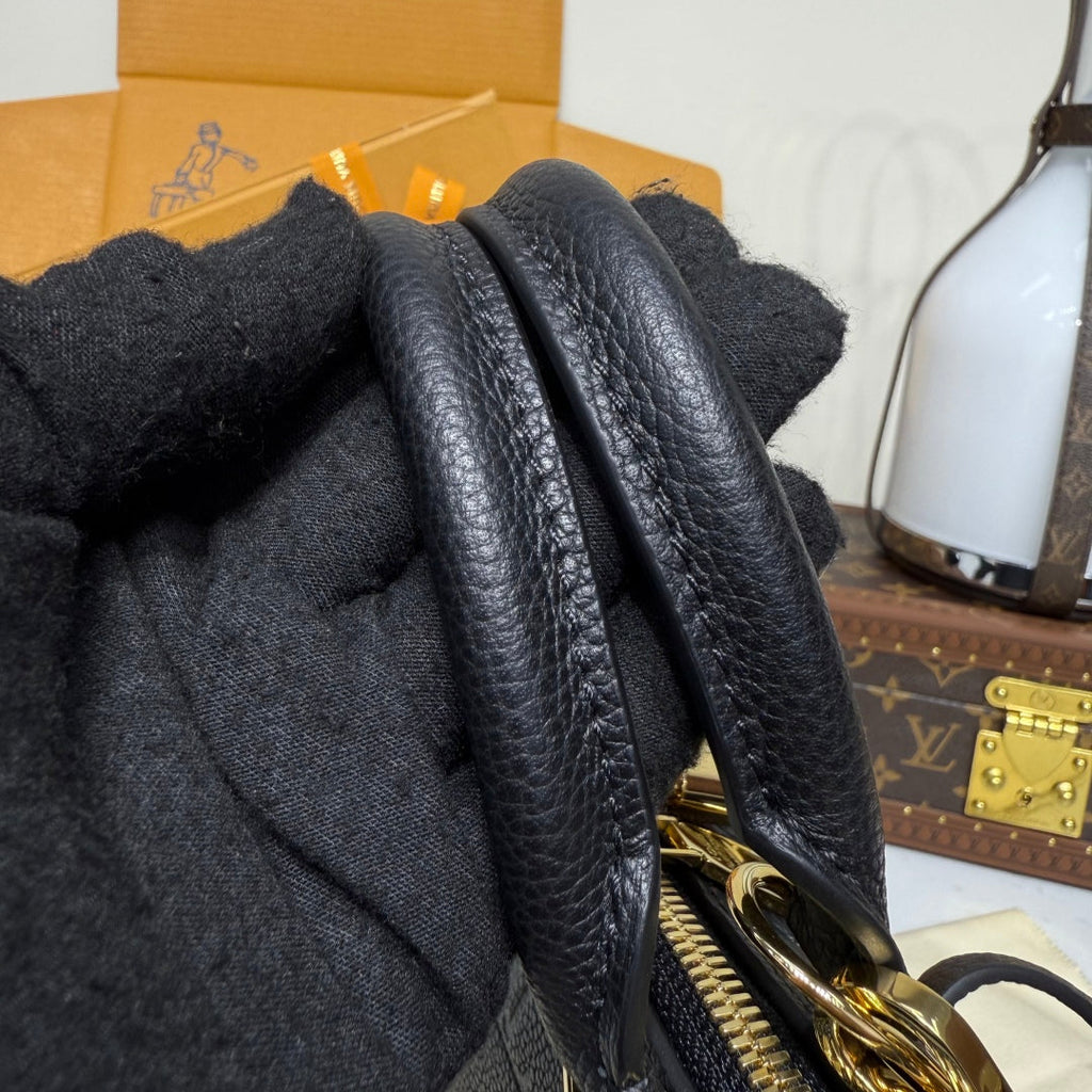 Bolso de piel repujada