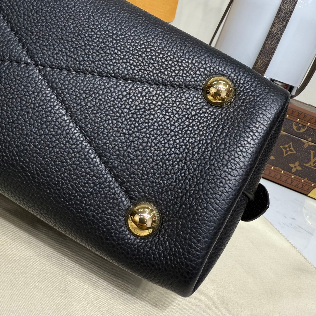 Bolso de piel repujada
