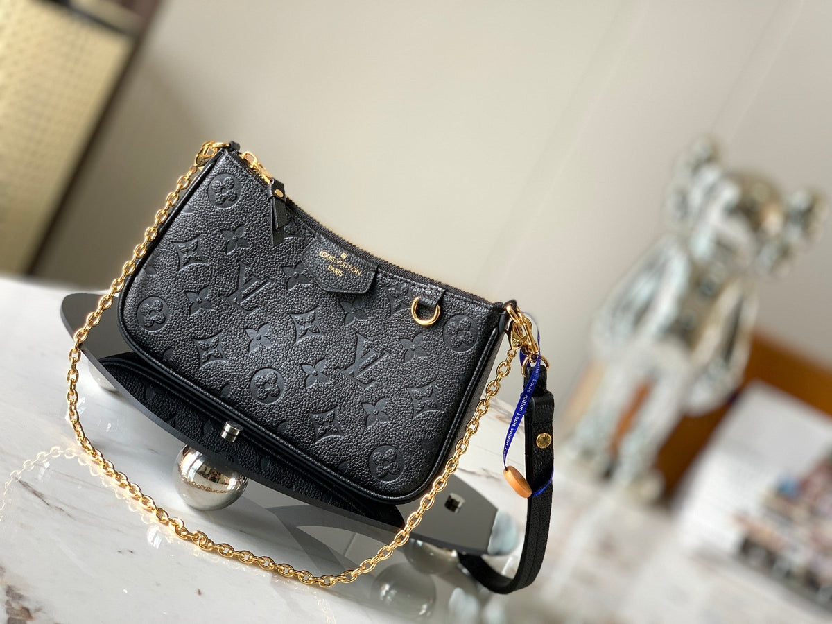 Bolso de hombro de piel repujada